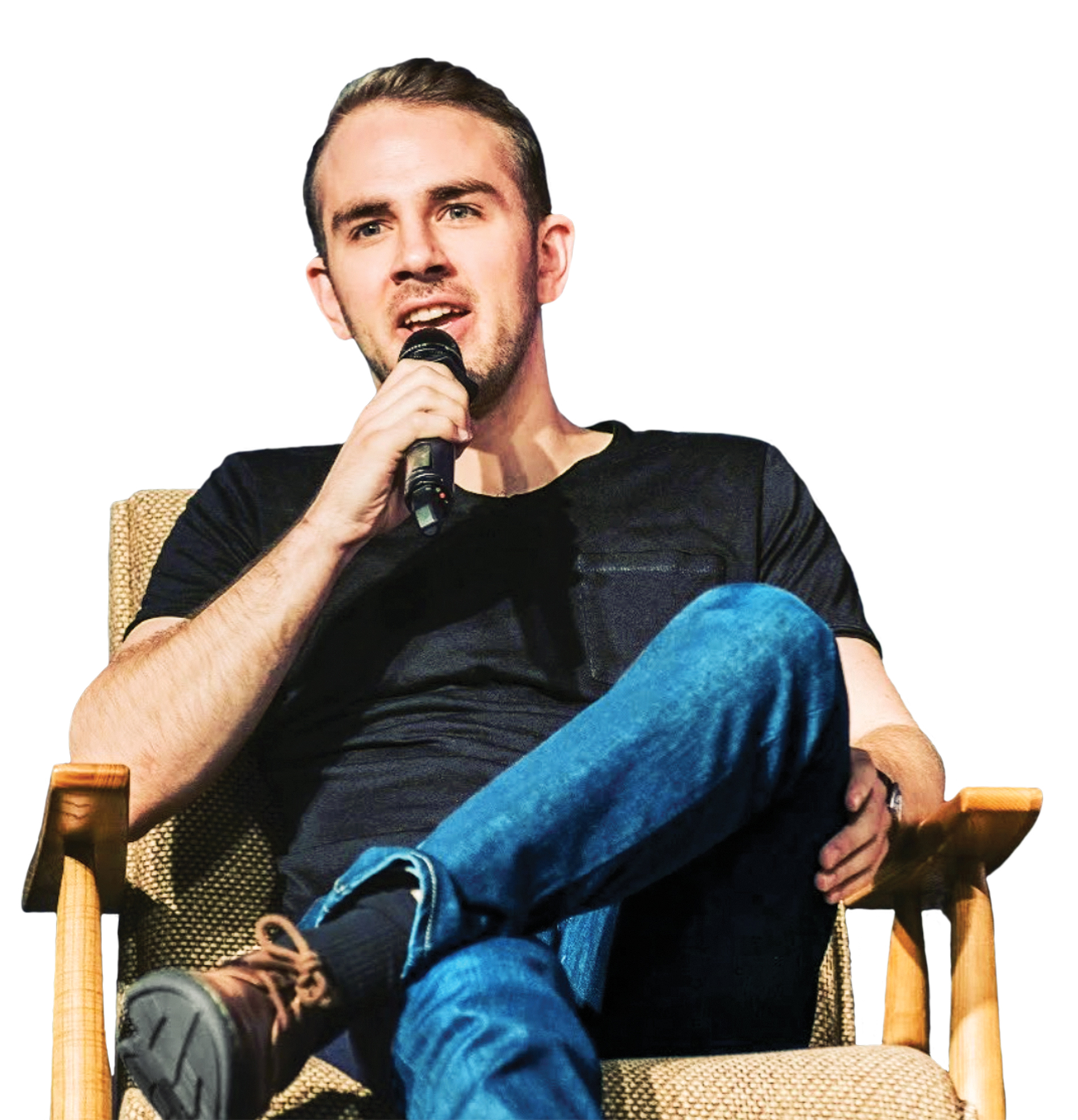 Image of Devin Finzer with a microphone