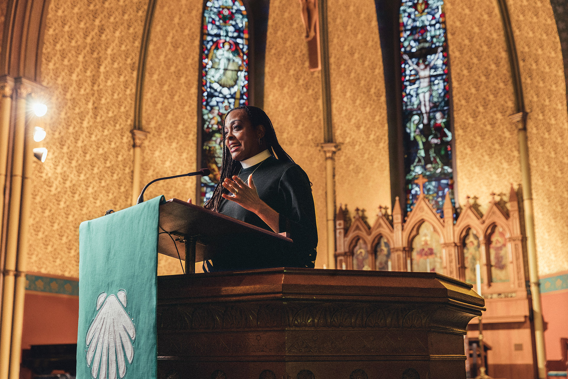 Image of Paula Clark at the pulpit of St. James Cathedral