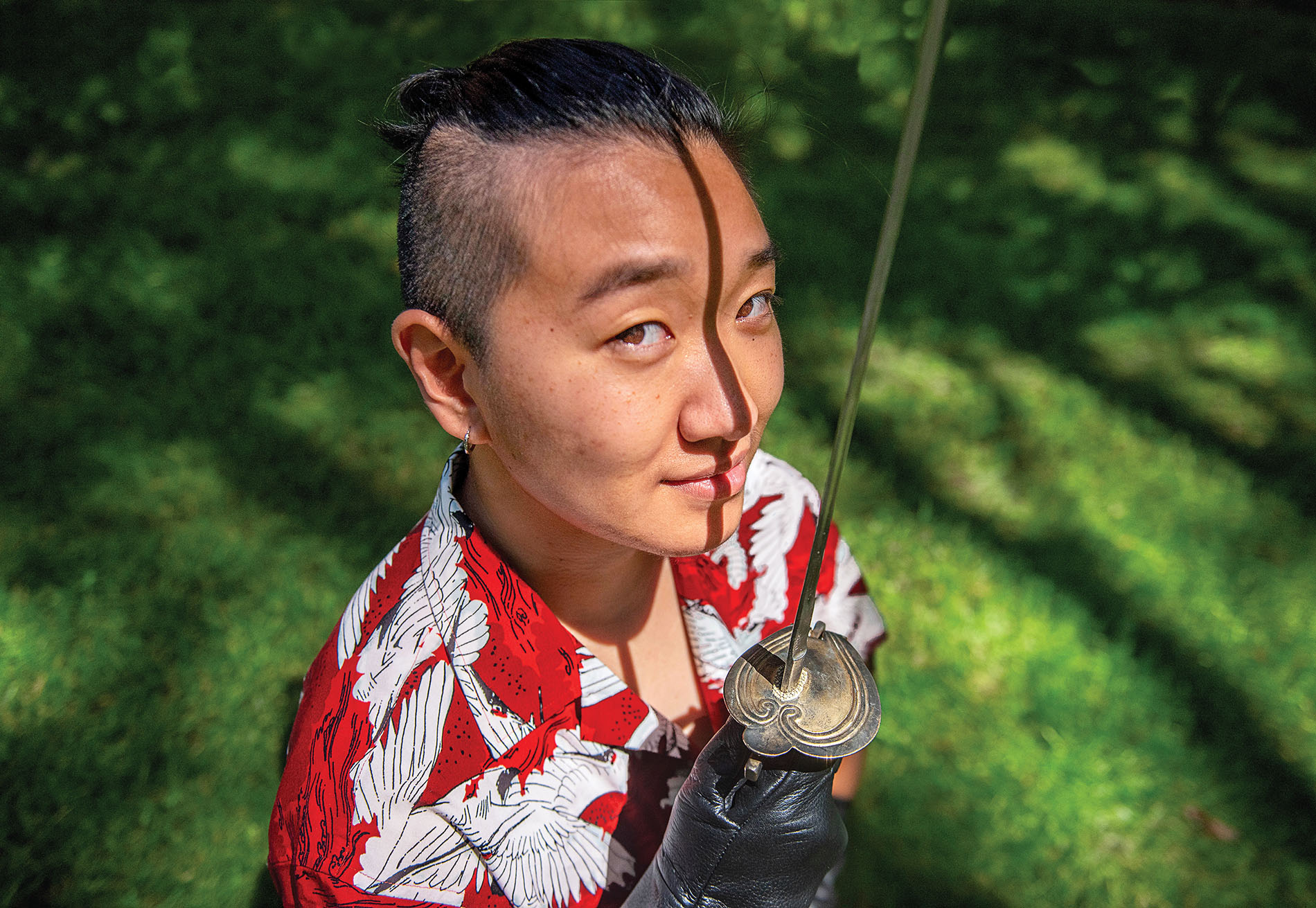 Image of Kris Cho with sword