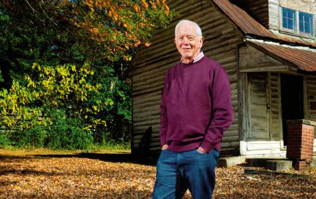 Image of J. Myrick Howard in front of a historic home in N.C.