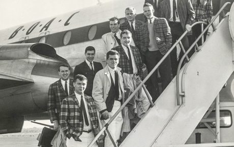 Archival image of the Jabberwocks boarding a plane in 1963.