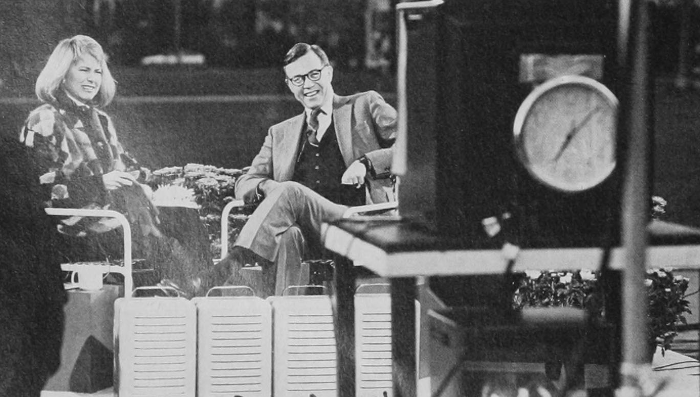 Archival image of Jane Pauley on set on campus in 1985
