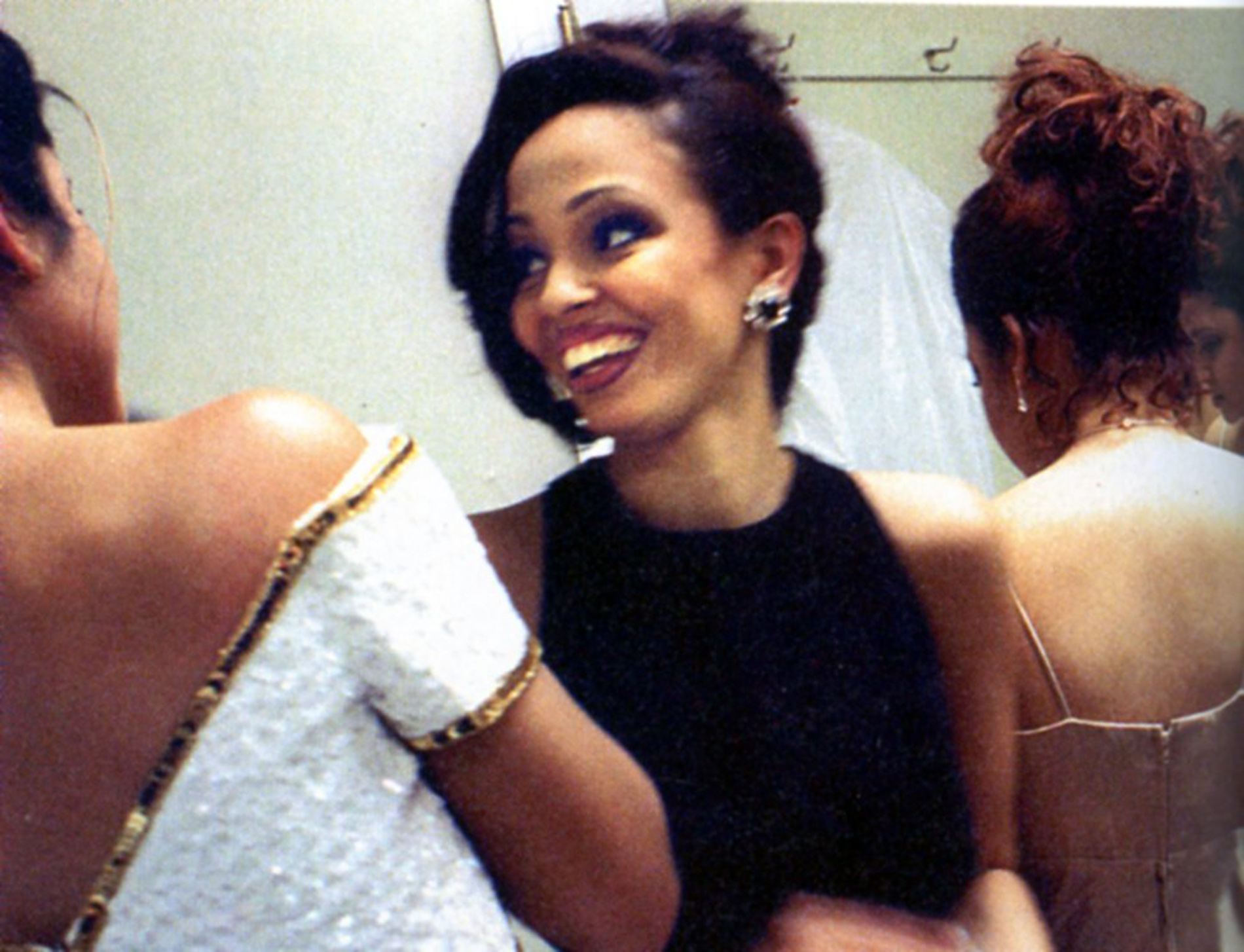 Archival image of Dilania Inoa backstage at a pageant in 1999.