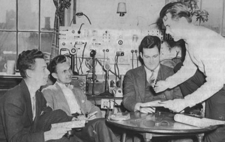 An archival image from the 1940's of an underground, student-led radio station in a dorm.