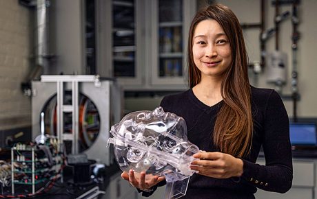 Renee Zhao holding a scientific tool