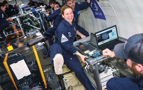 Student floating in zero gravity